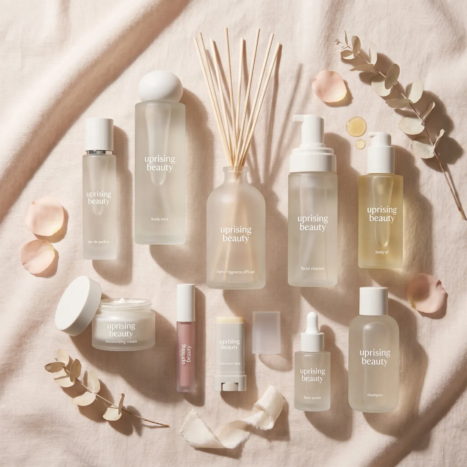 UpRising Beauty flatlay of cosmetic products and raw materials